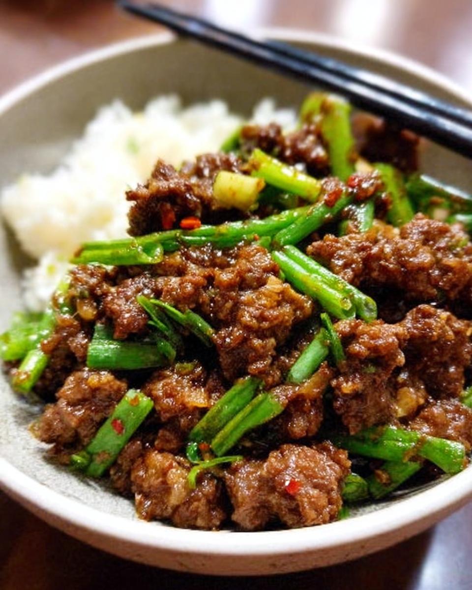 A quick and easy ground beef recipe with green beans and rice, perfect for weeknight meals.