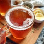 Close-up of a refreshing iced tea with lemon slices and honey, perfect for Starbucks drinks for busy weeknights.