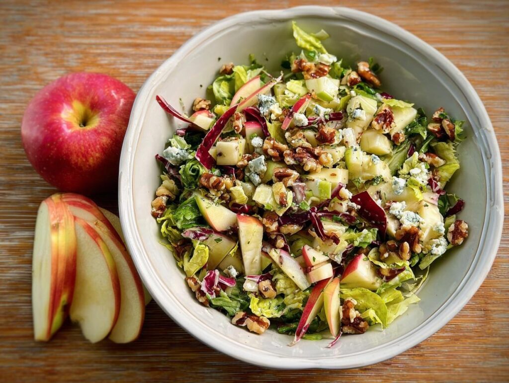 A refreshing Thanksgiving salad with apples, walnuts, blue cheese, and radicchio, perfect for a quick weeknight meal.